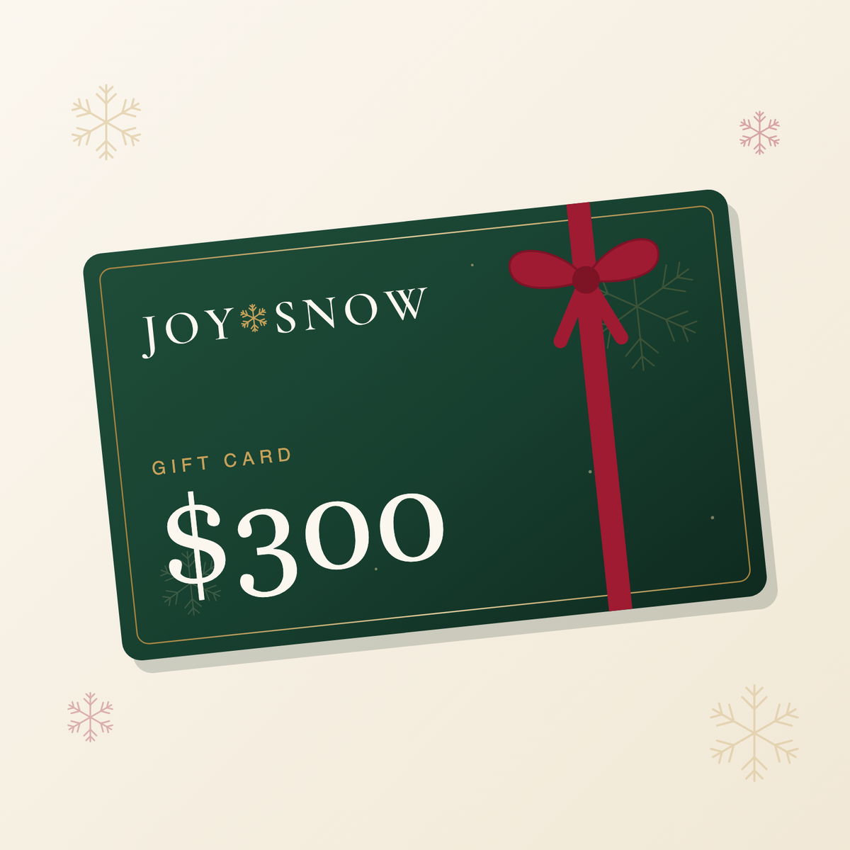 Joy Snow gift card, $300 — green card with gold snowflake and red ribbon